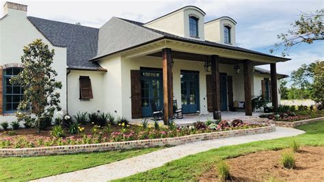 acadian style house with metal roof|acadian style houses.